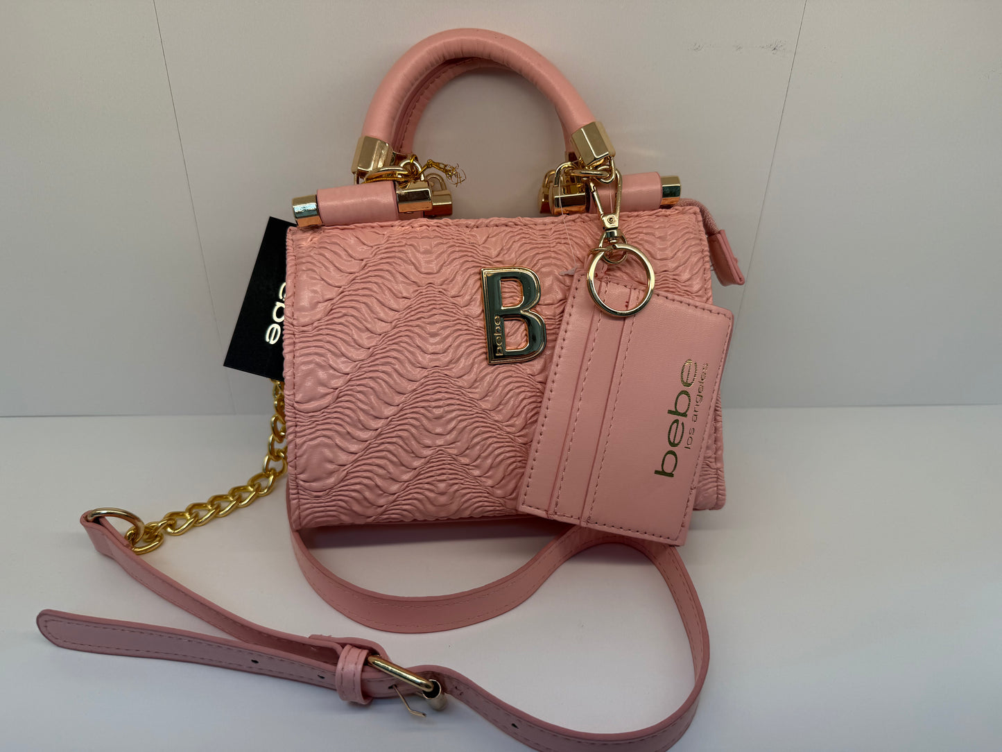 Bebe-Nola mini satchel with cushion chevron pattern