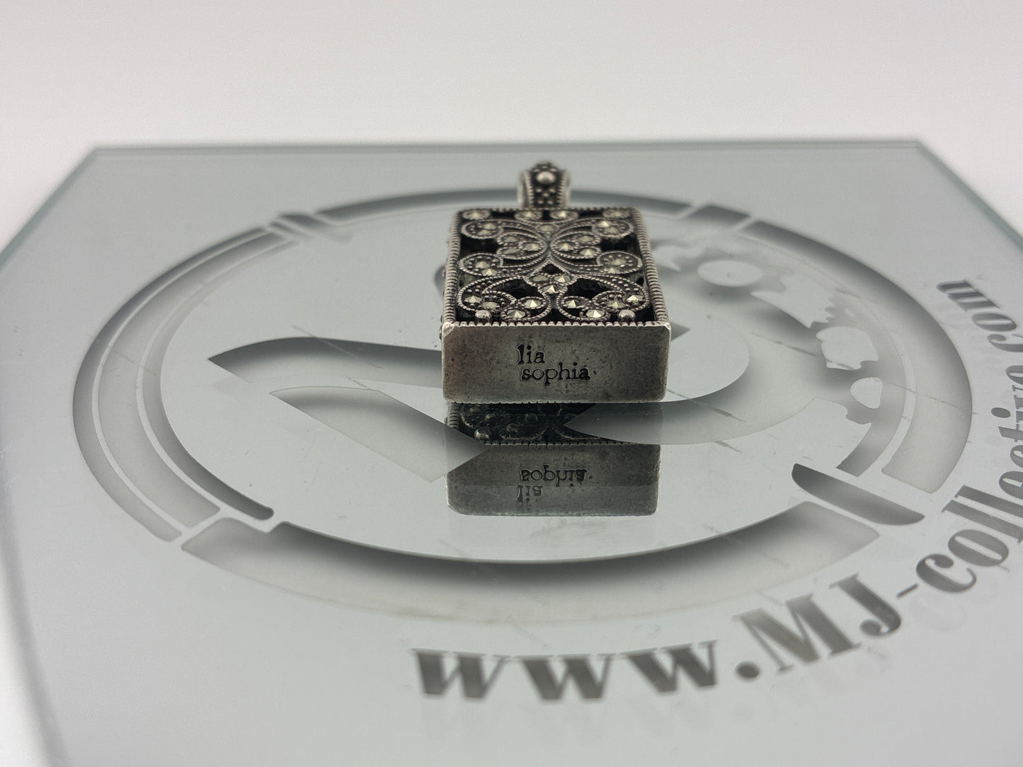 Silver toned charm Lia Sophia