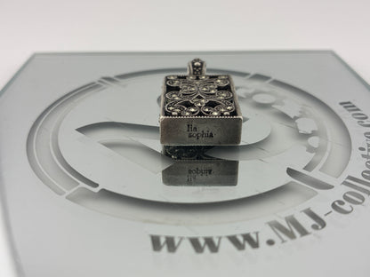 Silver toned charm Lia Sophia