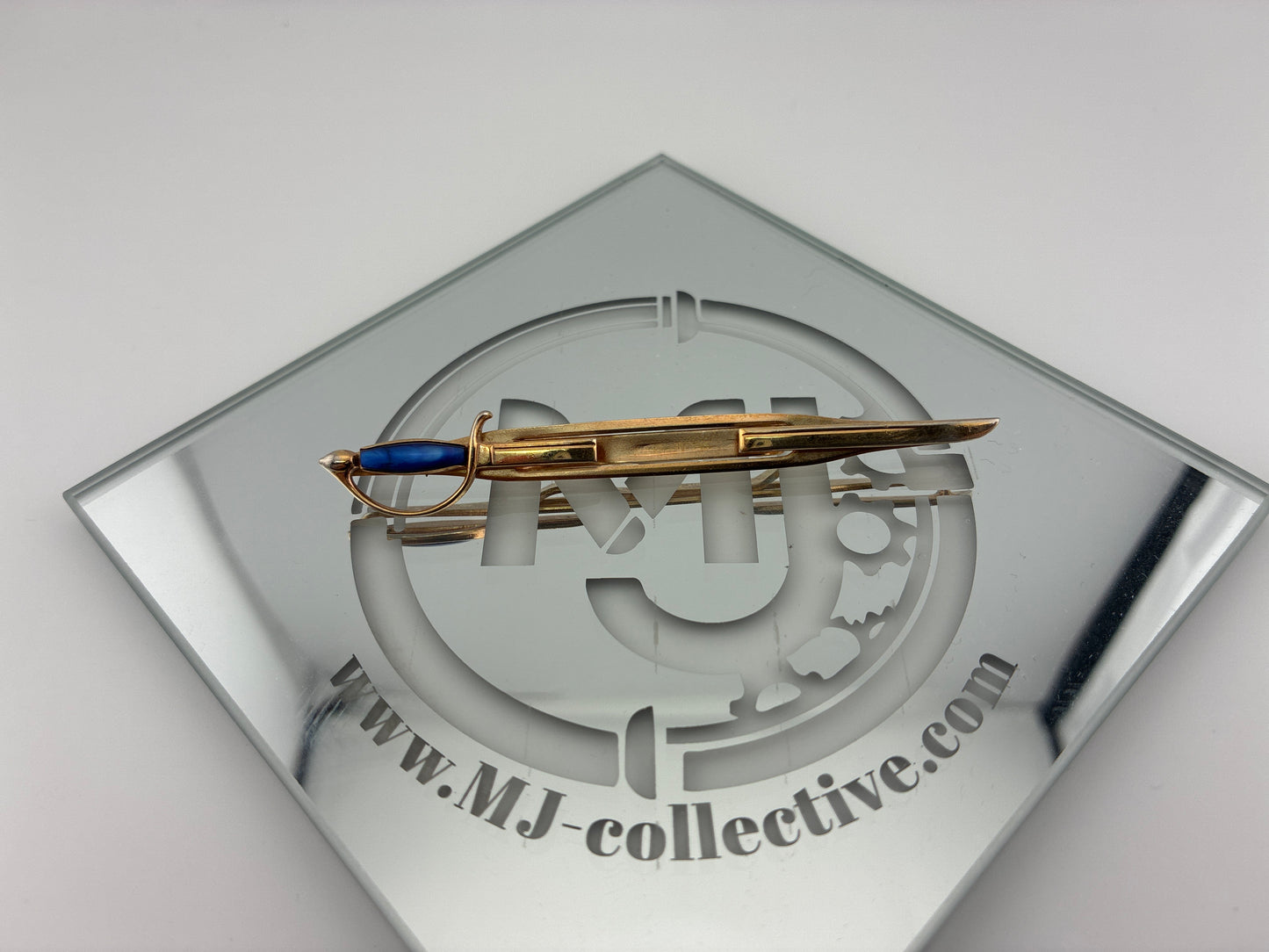 Swank sword tie clip