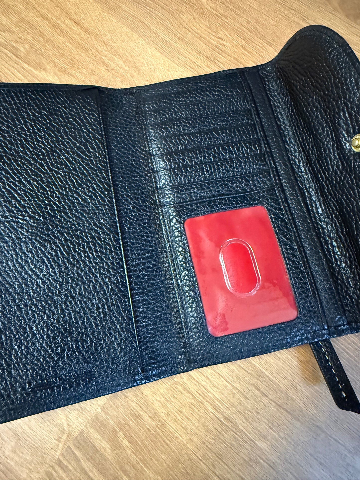 Dooney & Bourke Pebbled Leather Clutch - Black